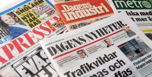 Nuotraukoje - švediški laikraščiai ir žurnalai.